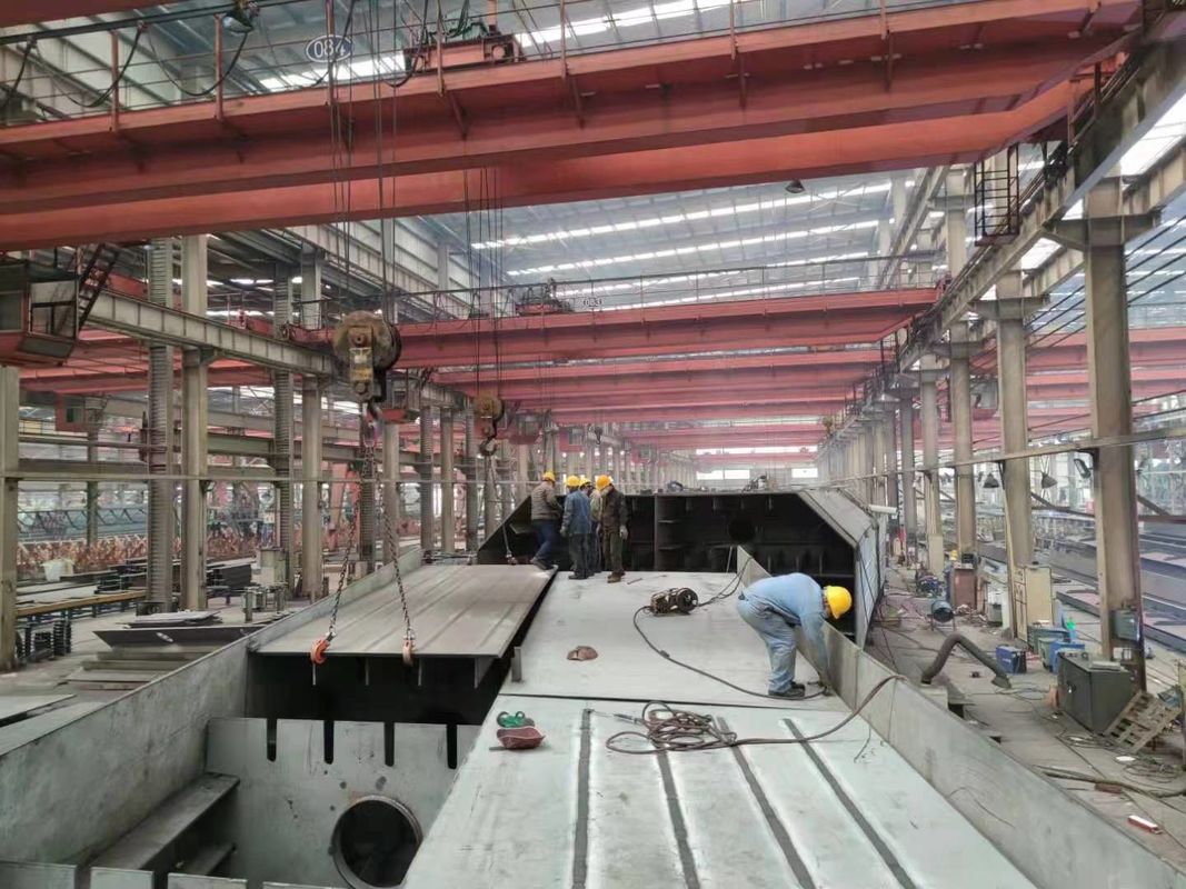 สร้างคลังสินค้าเหล็ก ออกแบบให้สูงและกว้าง พร้อมอุตสาหกรรมโครงสร้างเหล็ก Prefab กันพายุ